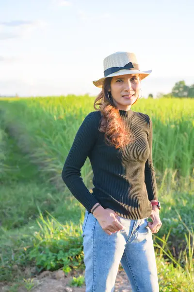 Thai Female with Rice Field Background, Phayao Province.