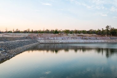 Reservoir with walkway at sunset, Chiang Mai province.