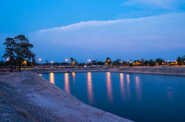 Reservoir with walkway at sunset, Chiang Mai province.