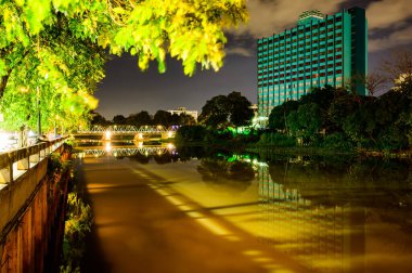 CHIANG MAI, THAILAND - September 7, 2020 : Iron Bridge with Ping River at Night in Chiang Mai Province, Thailand.