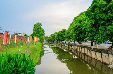 CHIANG MAI, THAILAND - April 13, 2021 : City Moat and Street at Hua Lin Corner in Chiangmai Province during Songkran Festival, Thailand.