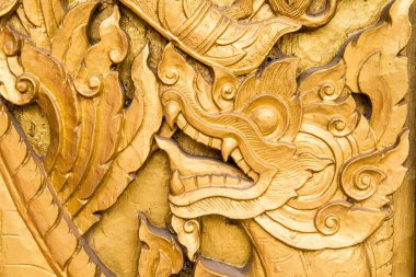 Tayland 'daki tapınakta Tahta Tayland tarzı oyma sanatı