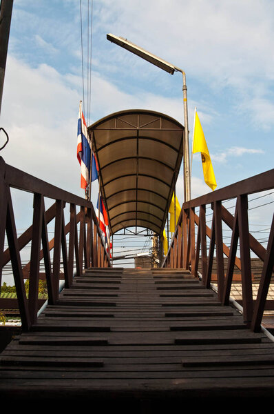 Slope up of wooden bridge, Thailand.