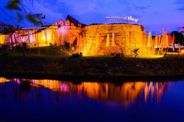 CHIANG MAI, THAILAND - April 13, 2021 : City Moat and Hua Lin Corner in Chiangmai Province during Songkran Festival at Evening, Thailand.