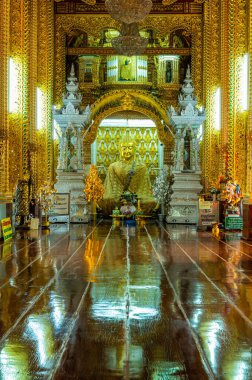 LAMPHUN, THAILAND - July 17, 2020 : Beautiful Buddha statue and beautiful church in San Pa Yang Luang temple, Lamphun province.