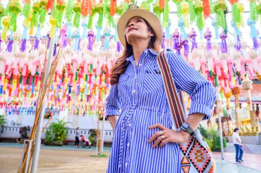 Woman Tourist in Lamphun Lantern Festival, Lamphun Thailand.