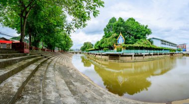 PHAYAO, THAILAND - August 14, 2020 : Panoramic view of canal in Chiang Kham district, Phayao province.