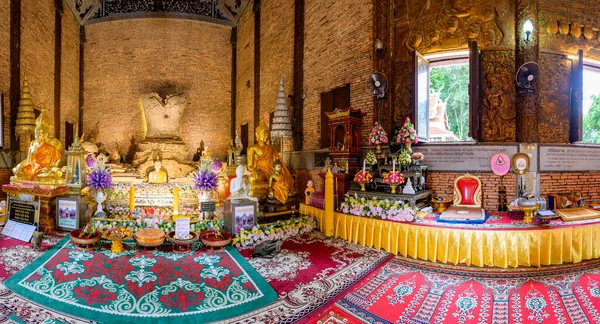 CHIANG RAI, THAILAND - July 18, 2020 : Panorama View of Ancient Buddha Statue at Wat Phrathat Pha Ngao, Chiang Rai Province.