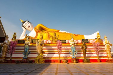 Reclining Buddha statue of Phra That Doi Kham temple, Chiang Mai province.