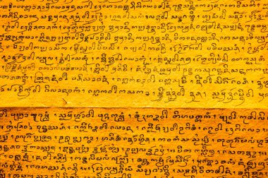 CHIANG MAI, THAILAND - February 11, 2021 : Lanna Alphabet in Ancient Book, Chiang Mai Province.