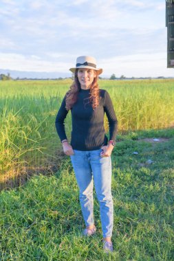 Thai Female with Rice Field Background, Phayao Province.