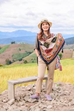 Asian Woman with Rice Field Background at Pa Bong Piang Rice Terraces, Chiangmai Province.