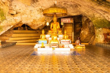 Phra Sabai cave with golden Buddha in Lampang province, Thailand.