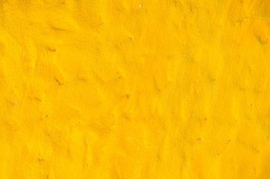 Sarı beton duvarın arka planı, Tayland.