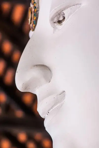 Face of white buddha sculpture, Thailand