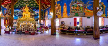 NAN, THAILAND - November 5, 2020 : Panorama View of Old Buddha Statue with Thai Style Church in Prang Temple, Nan Province.