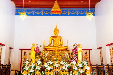 Golden Buddha Statue or Luang Phor Sri Sawan at Nakhonsawan Province, Thailand. clipart