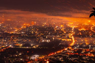 Chiangmai city with fireworks in the night, Thailand.