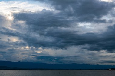 Kwan Phayao lake with rain clouds, Thailand.