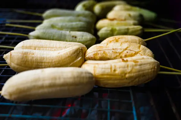 Grilled bananas on the stove. Grilled bananas is a popular food cooked in rural Thailand.