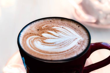 Kahve fincanında süt köpüklü sanat, kahve fincanında Latte sanat.