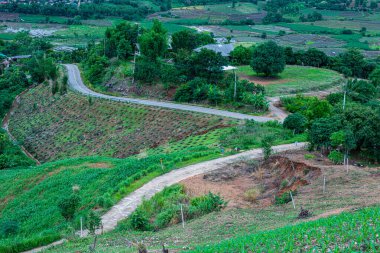 Agricultural area with mountain view of Mae Chaem district in Chiang Mai province, Thailand. clipart