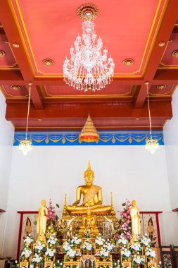 Golden Buddha Statue or Luang Phor Sri Sawan at Nakhonsawan Province, Thailand. clipart