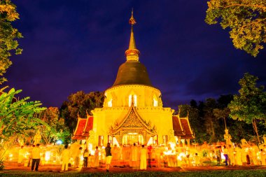 Triple Circumambulation of Visakha Bucha Day at Darabhirom Forest Monastery, Thailand. clipart