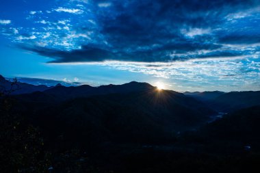 Mountain view  with mist at Wat Phrathat Doi Leng view point, Thailand. clipart