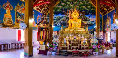 NAN, THAILAND - November 5, 2020 : Panorama View of Old Buddha Statue with Thai Style Church in Prang Temple, Nan Province.