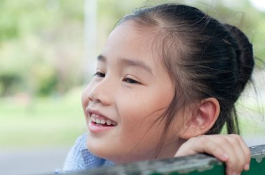 Tayland 'da küçük güzel bir Asyalı kızın portresi..