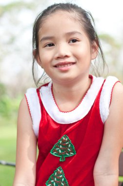 Tayland 'da Noel Baba kırmızı elbiseli güzel bir genç kız..