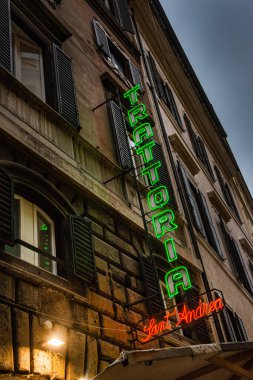 Neon sign outside a restaurant in Rome, by Pascal Kehl