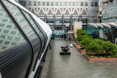 Modern architecture at Adams Plaza Pedestrian Bridge, One Canada Square, Canary Wharf, London