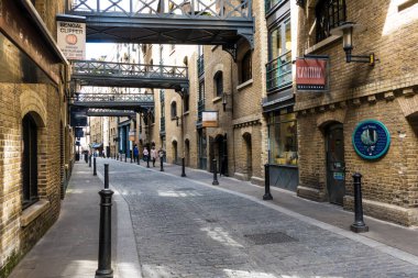 Converted warehouses in Shad Thames, a historic riverside street next to Tower Bridge in Bermondsey, London, England