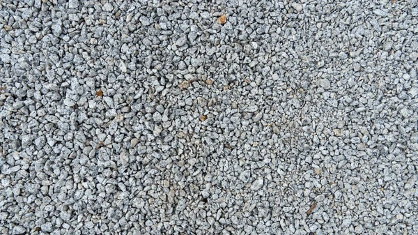 Above view of gravel for construction. with more grains of gravel. for background and textured.