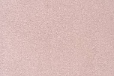 Arka planda kaba krem rengi var. arkaplan ve desenli.