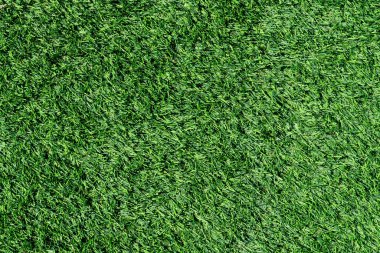 Above view of green Artificial grass. Used for decorating the garden around the house to remove weeds or for cleanliness. for background and textured. clipart