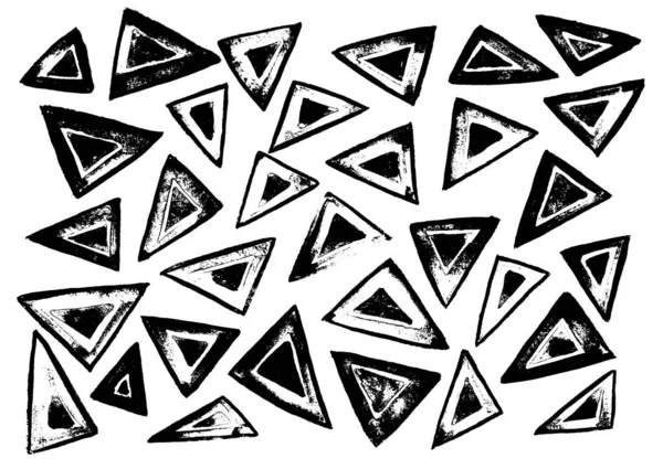 Black and white triangles of different sizes on a white background. Ink. Printing.
