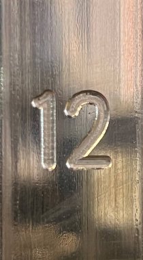 number two on the wall of a house