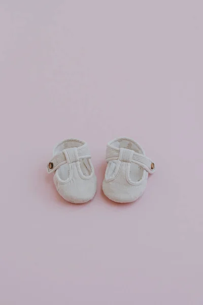 Newborn Children Mini Sandal Shoes Baby Shoes Pastel Pink Background — Stock Photo, Image