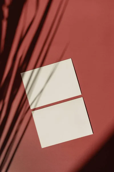 Blank Paper Sheet Card Mockup Copy Space Crimson Red Background — Zdjęcie stockowe