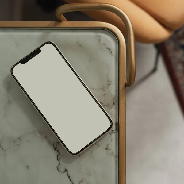 Flatlay of blank clipping path screen mobile phone on marble table. Aesthetic lady, girl boss online shop, store, blog template with mockup space. Flat lay, top view