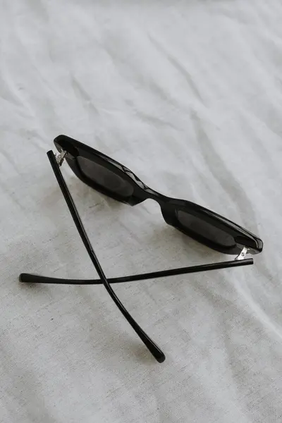 Black Female Sunglasses Neutral Beige Cloth — Stock Photo, Image