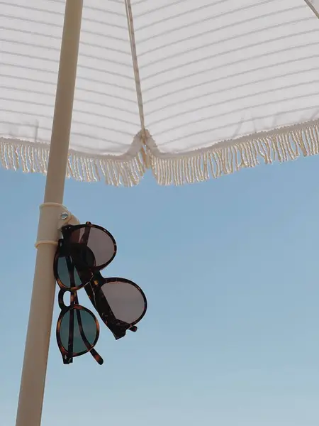 Sunglasses Beach Umbrella Blue Sky — Stock Photo, Image