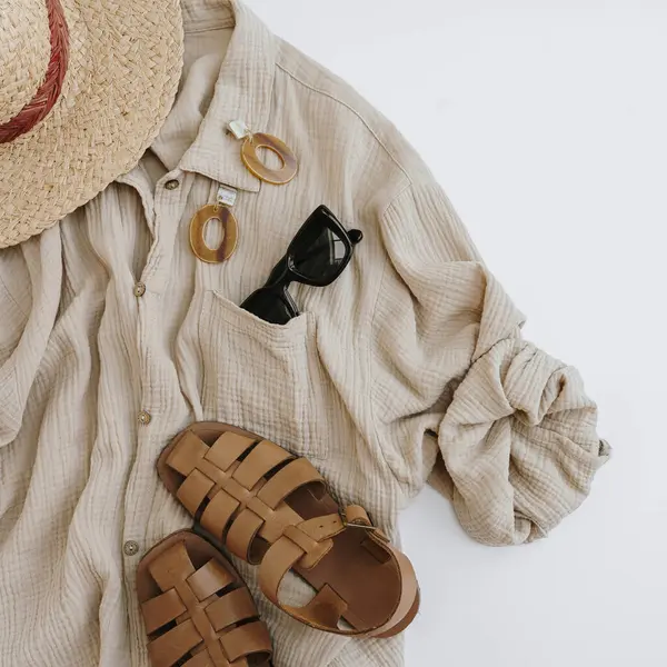 Aesthetic fashion composition with female summer beach clothes and accessories. Flat lay, top view. Elegant chic online store, online shopping, blog, social media branding concept