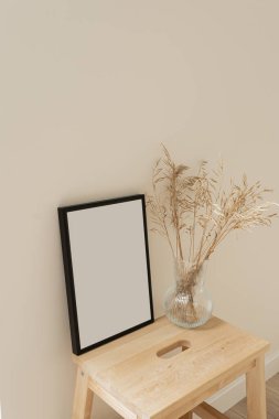 Kurutulmuş çimen buketi ile boş fotokopi alanı olan fotoğraf çerçevesi. En düşük boho biçimli iç tasarım modelleme şablonu