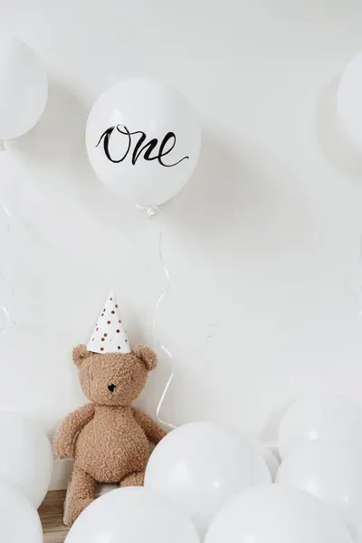 Teddy bear in party hat with balloon signed \