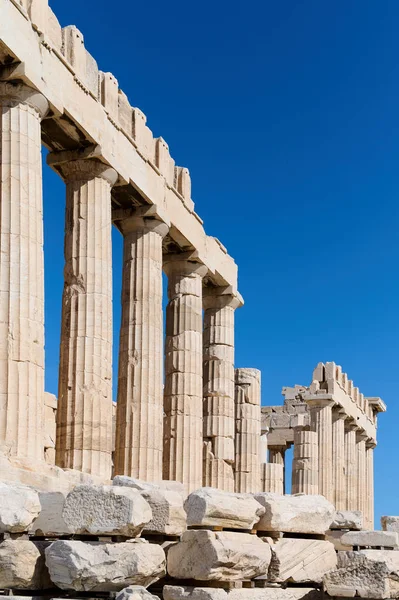 stock image Ancient temple Parthenon in Acropolis Athens Greece on a bright blue sky background. The best travel destinations. Vertical photo.