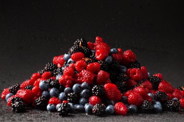 Seamless pattern raspberry blackberry and blueberry. Tropical abstract background. Flatley raspberries blackberries and blueberries. Abstract background of useful berries